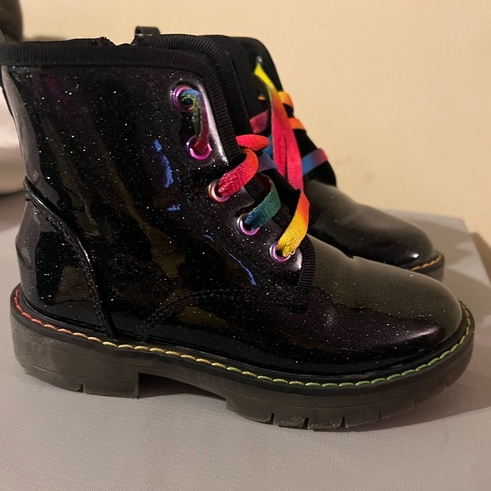 Super cute Doc Martens style boot.  Sparkling glitter on black